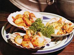 Conchas de pescados y mariscos gratinadas
